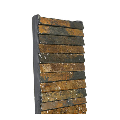 Close-up of the wet slate bars of the AVA XL water wall